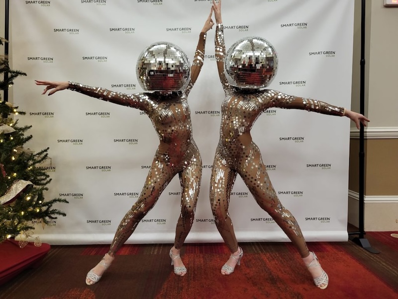 Mirror ball dancers at a quinceañera celebration